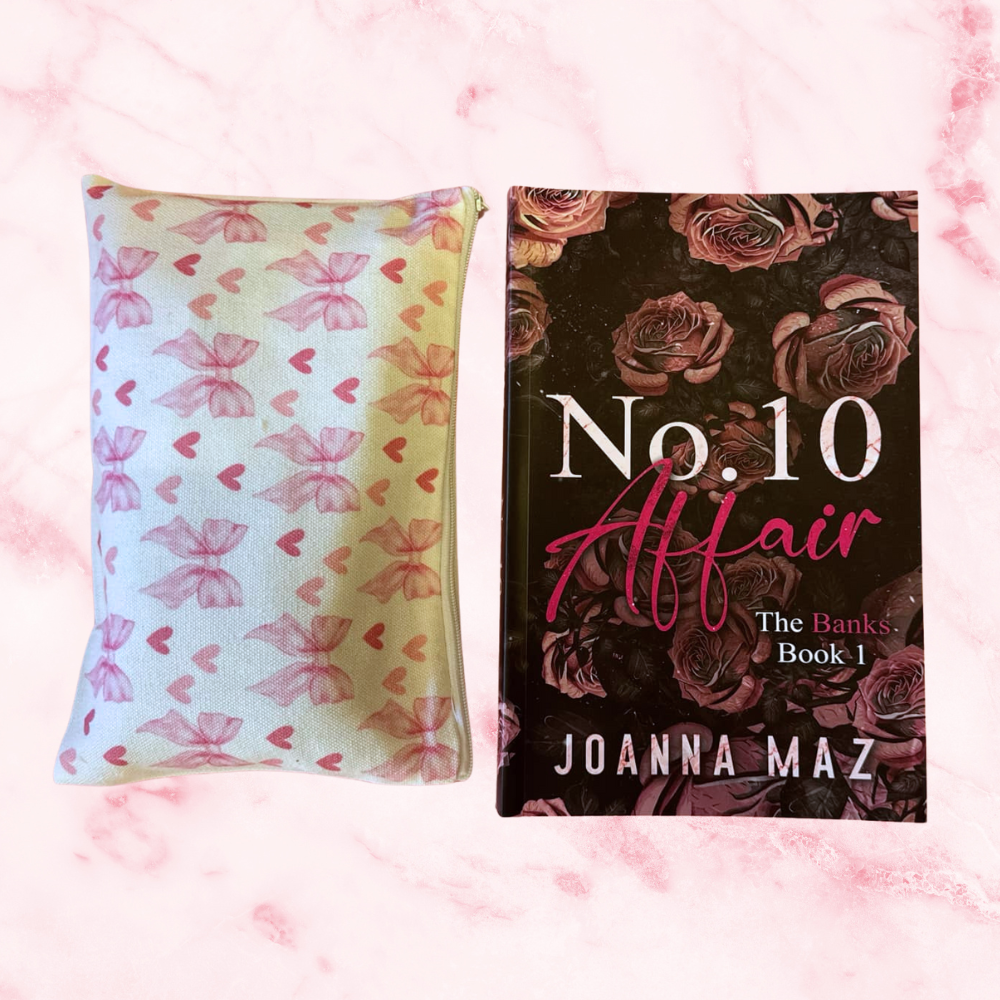 Front view of the book Number 10 Affair by Joanna Maz. It has a discreet cover with flowers. The make up bag has pink bows on the design. 