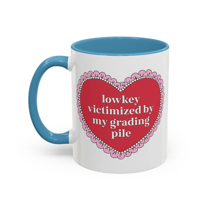 Lowkey Victimized by My Grading Pile Coffee Mug